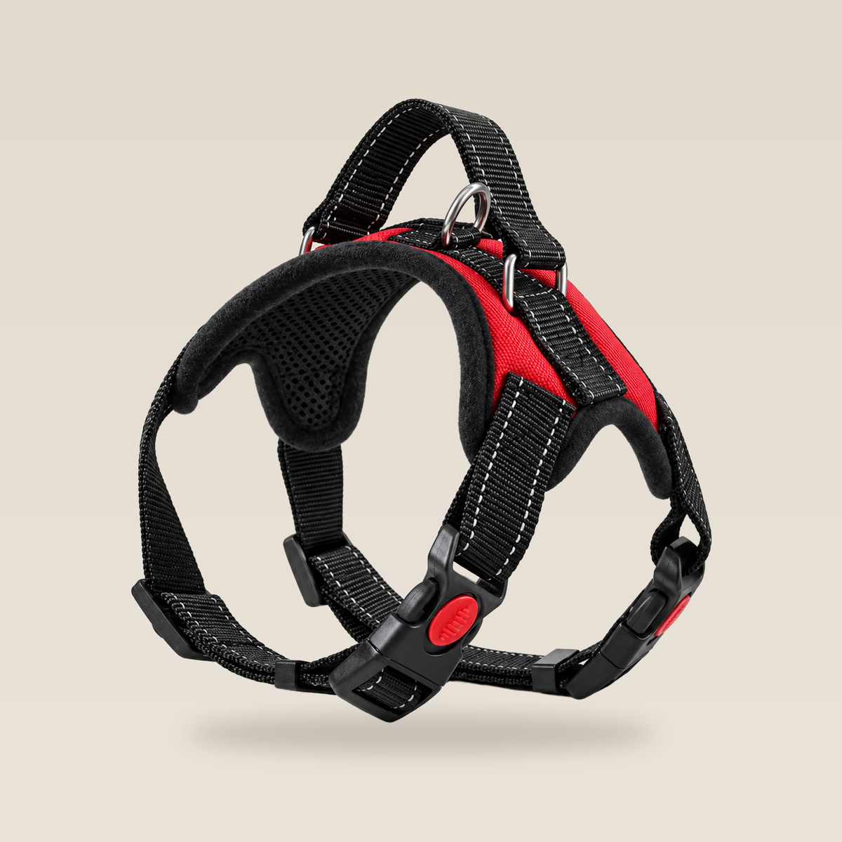 Red Comfort Pro padded dog harness on a warm cream studio background